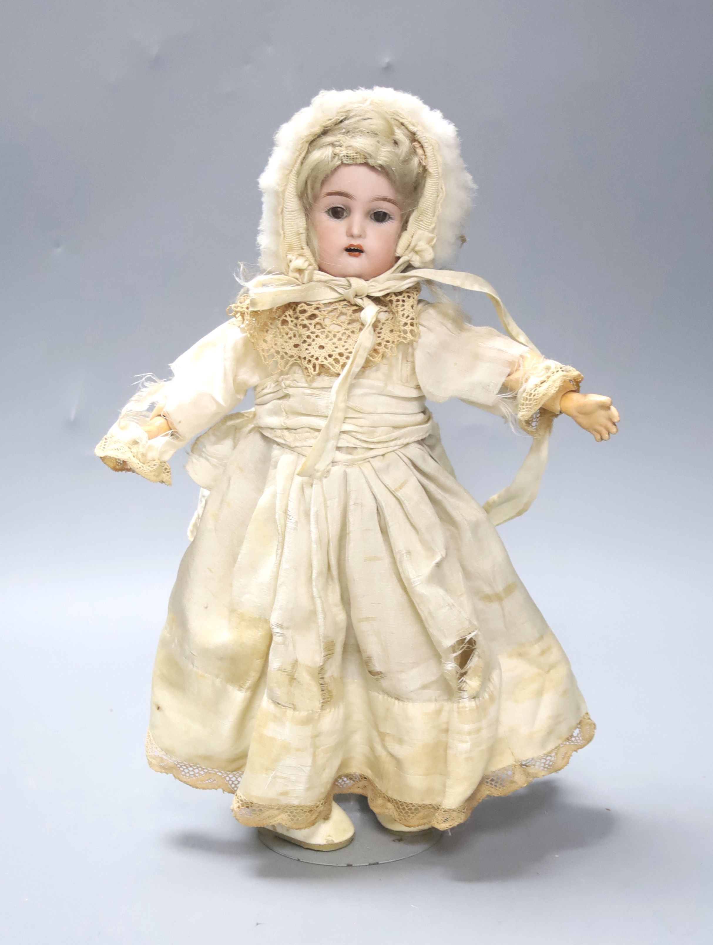 A Kammer & Reinhardt bisque doll, original clothes and shoes, 29cm